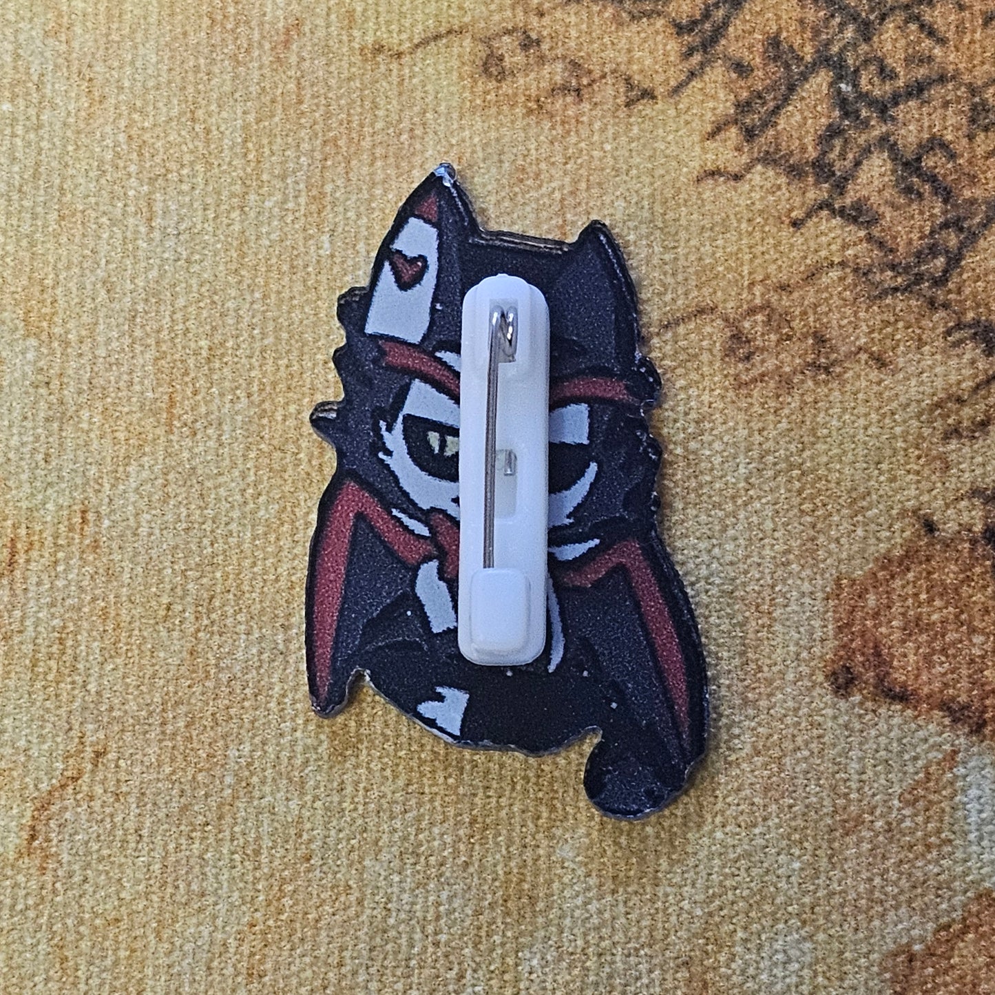 168: Husk Acrylic Pin