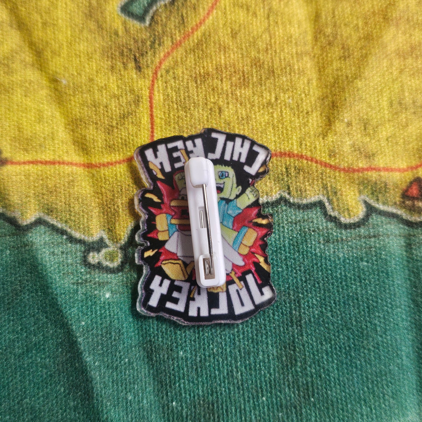 179: Chicken Jockey Acrylic Pin