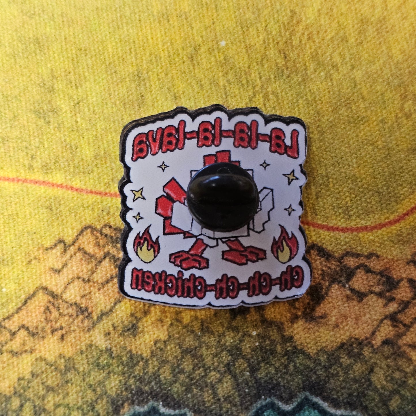 168: Lava Chicken Acrylic Pin