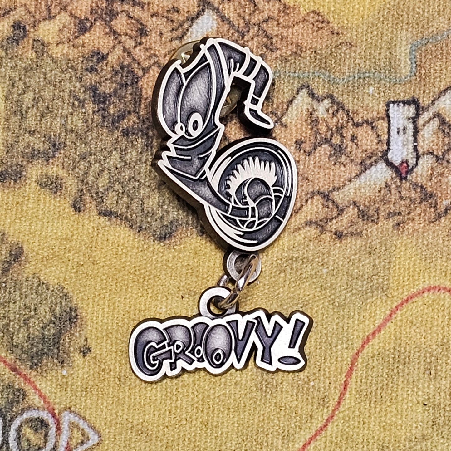 027: Groovy Dangle Pin